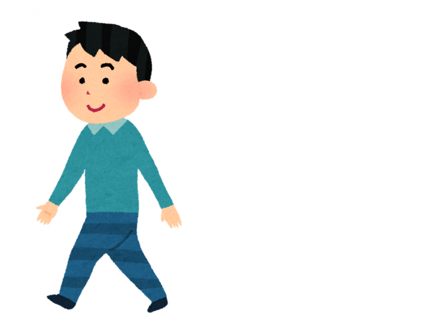 歩く男性の画像